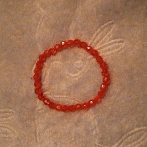 Minimalist handmade shiny and iridescent fun casual bright red bracelet